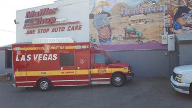 A Las Vegas fire truck in front of the Muffler Shop