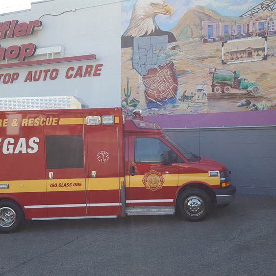 A Las Vegas fire truck in front of the Muffler Shop
